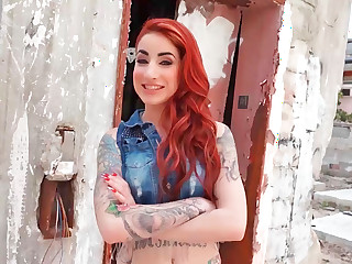 Redhead is having some sex while outside in a ruin